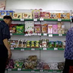 Wong Maye-E/AP/TT: Både konsument och producentpriserna sjönk i juli, jämfört med samma period i fjol. Arkivbild.